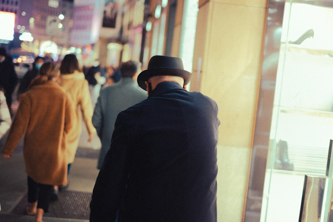 detective walking in city